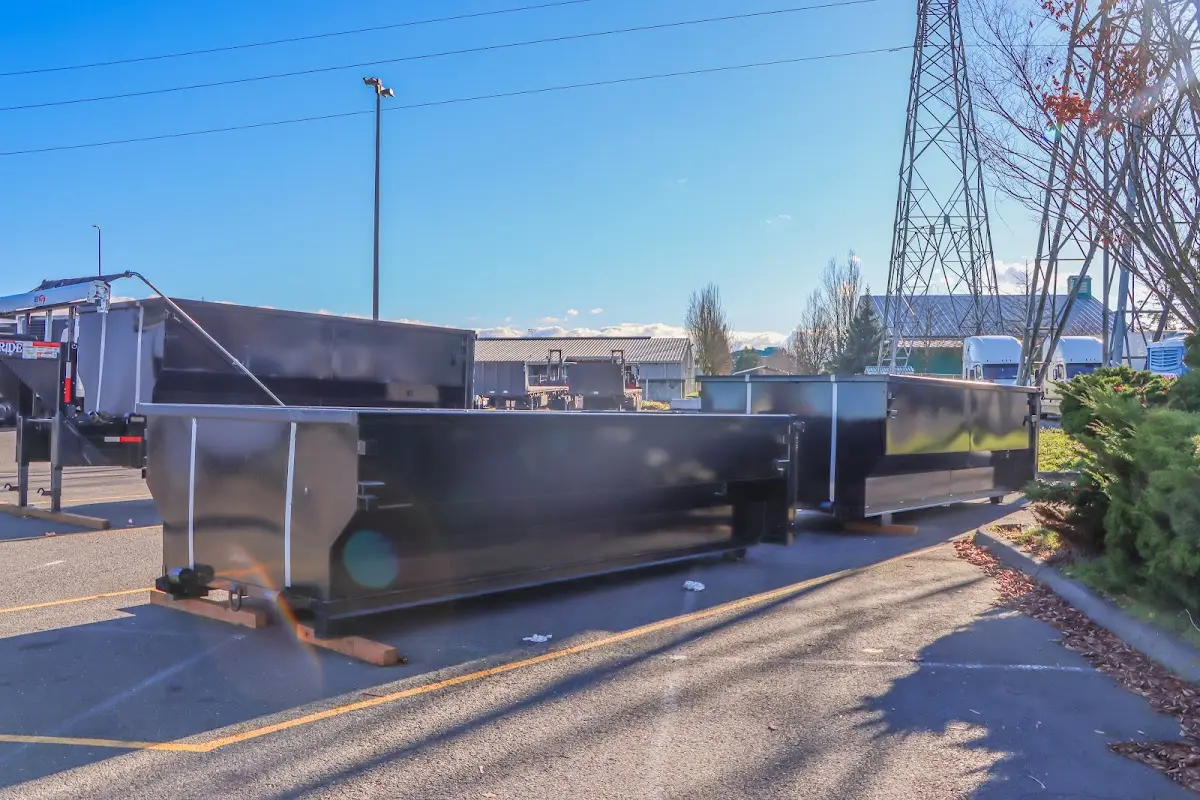 Roll-off dumpster ready for waste disposal at job site for Construction Dumpster Rental in Maquoketa
